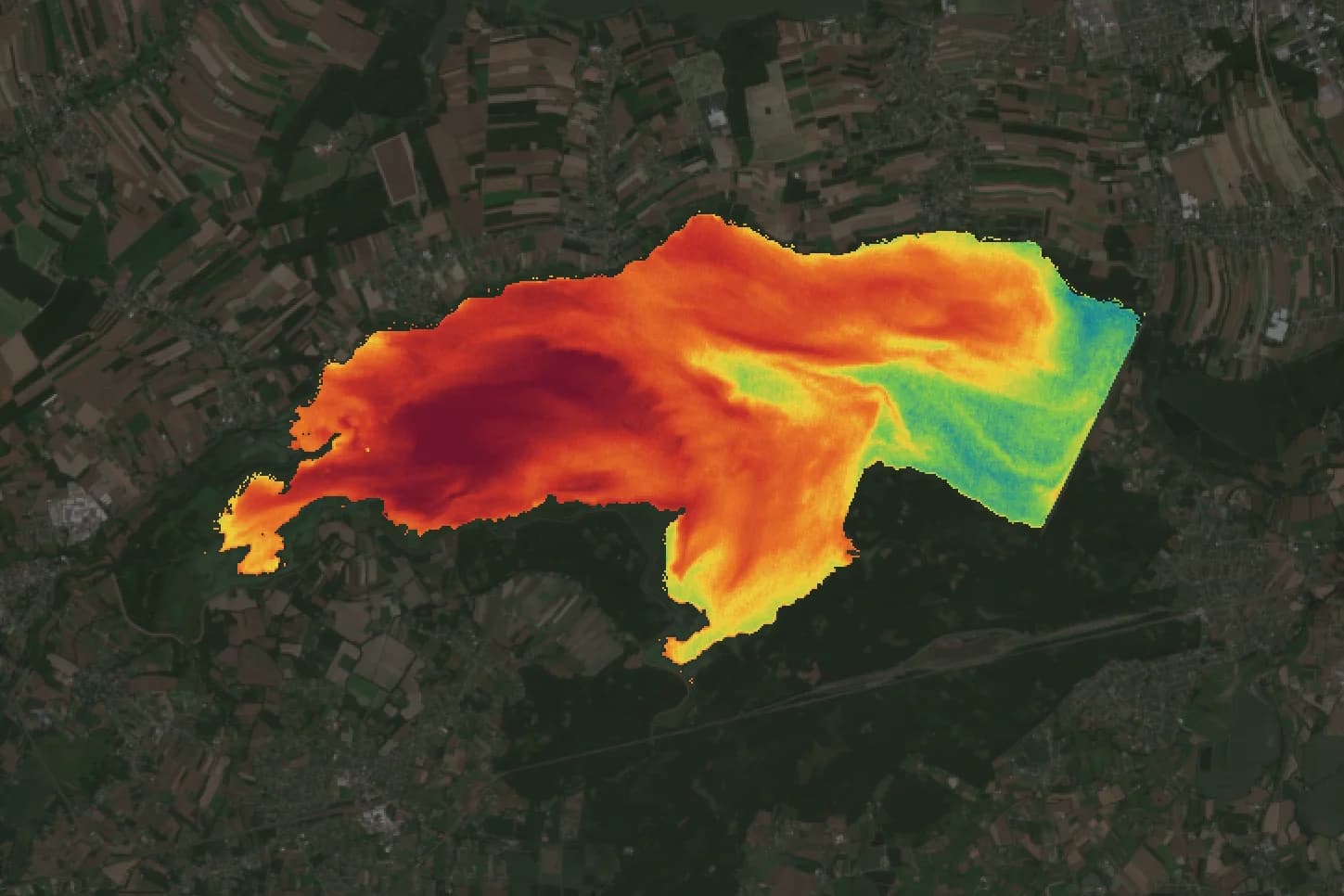 Chlorophyll map of a supply reservoir and its surroundings in July, strongest in the western basin